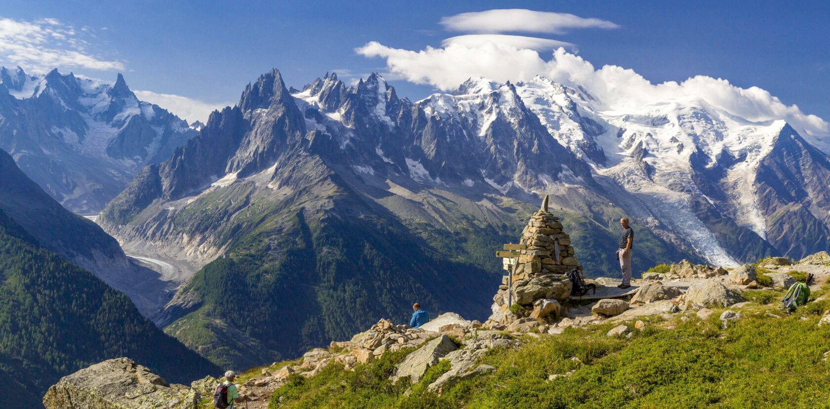 Image of a pristine Alpine lake and mountain trail